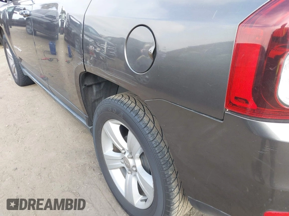 2014 Jeep Compass Sport with VIN 1C4NJCBB4ED789823, listed as a IAAI auction lot 41215251 with 152,709 mi miles. Bid and sale history available at carsss.com. Image 16.