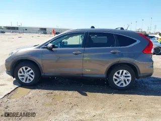 2015 Honda CR-V EX-L with VIN 2HKRM3H7XFH519437, listed as a IAAI auction lot 41656984 with 143,107 mi miles. Bid and sale history available at carsss.com. Image 14.