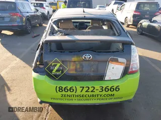 2006 Toyota Prius z VIN JTDKB22U763141508, wystawiony jako IAAI lot #41449413 z przebiegiem 243 914 mil mil oraz . Historia ofert i sprzedaży dostępna na DreamBid. Obrazek 15.