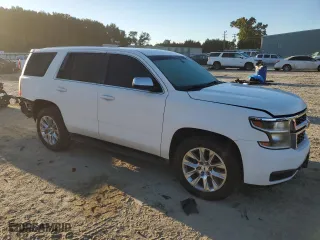 2015 Chevrolet Tahoe Commercial with VIN 1GNSK2ECXFR695889, listed as a Copart auction lot 74369994 with 196,209 mi miles and Salvage Title. Bid and sale history available at carsss.com. Image 4.