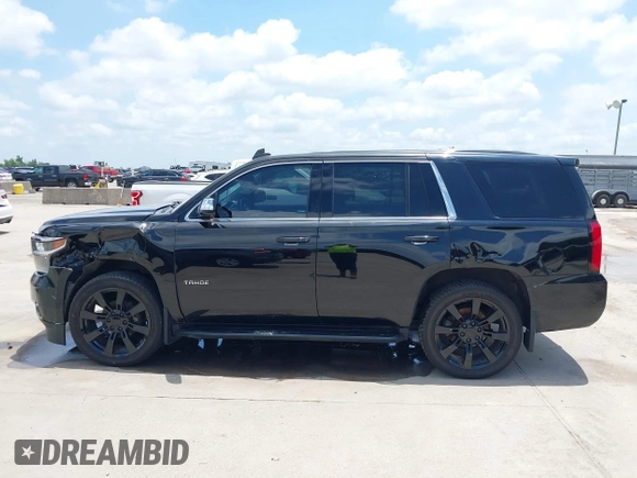 2015 Chevrolet Tahoe with VIN 1GNSK2KC4FR610534, listed as a IAAI auction lot 42357319 with 140,479 mi miles and . Bid and sale history available at DreamBid. Image 14.