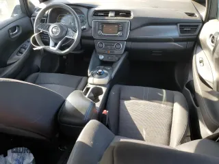 2018 Nissan LEAF S with VIN 1N4AZ1CP7JC304506, listed as a Copart auction lot 49539735 with 101,065 mi miles and Salvage Title. Bid and sale history available at DreamBid. Image 8.