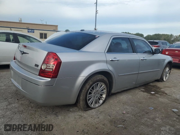 2010 Chrysler 300 Touring with VIN 2C3CA5CV7AH233311, listed as a Copart auction lot 71341054 with 208,160 mi miles and Salvage Title. Bid and sale history available at carsss.com. Image 3.