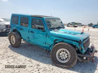 2024 Jeep Wrangler Rubicon X with VIN 1C4RJXFG1RW180410, listed as a Copart auction lot 58039785 with 3,381 mi miles and Salvage title. Bid and sale history available at DreamBid. Image 4.