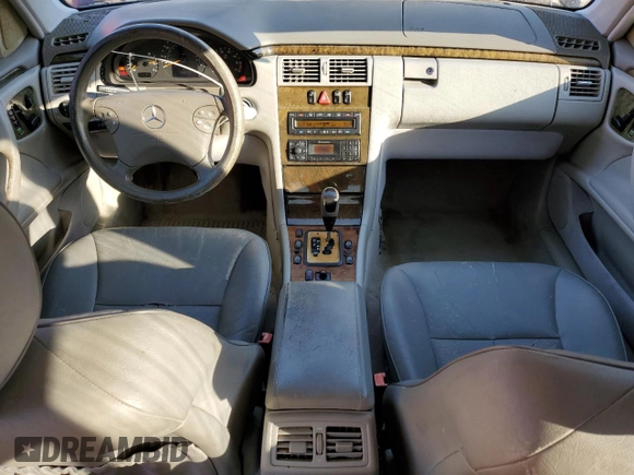 2002 Mercedes-Benz E-Class with VIN WDBJF65J32B494321, listed as a Copart auction lot 77557334 with 198,820 mi miles and Salvage Title. Bid and sale history available at carsss.com. Image 8.
