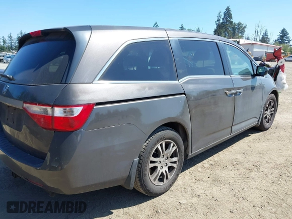 2012 Honda Odyssey EX-L with VIN 5FNRL5H64CB127523, listed as a IAAI auction lot 39818448 with 102,514 mi miles and . Bid and sale history available at DreamBid. Image 4.
