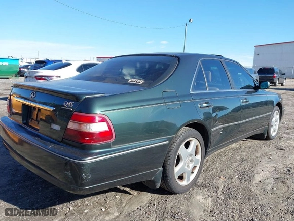 2000 Infiniti Q45 with VIN JNKBY31A7YM301457, listed as a IAAI auction lot 41583825 with 174,265 mi miles. Bid and sale history available at carsss.com. Image 6.