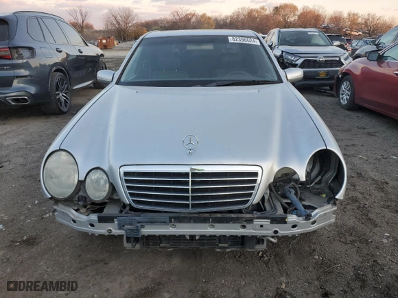2000 Mercedes-Benz E-Class with VIN WDBJF70J7YB049473, listed as a Copart auction lot 82396624 with 197,515 mi miles and Salvage Title. Bid and sale history available at carsss.com. Image 5.