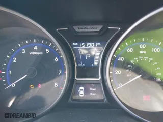 2014 Hyundai Veloster Turbo with VIN KMHTC6AE5EU201714, listed as a IAAI auction lot 40671069 with 151,901 mi miles. Bid and sale history available at carsss.com. Image 7.