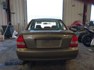 2000 Mazda Protege DX with VIN JM1BJ2225Y0278677, listed as a IAAI auction lot 42056816 with 188,552 mi miles and . Bid and sale history available at DreamBid. Image 16.