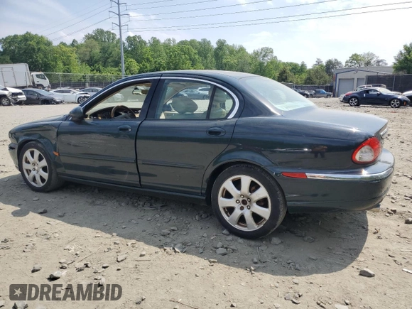 2004 Jaguar X-Type with VIN SAJEA51C64WE17722, listed as a Copart auction lot 55416405 with 89,047 mi miles and Salvage Title. Bid and sale history available at DreamBid. Image 2.