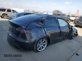2024 Tesla Model Y Long Range with VIN 7SAYGDEE6RF063230, listed as a Copart auction lot 42872535 with Not Provided miles and Salvage Title. Bid and sale history available at DreamBid. Image 3.