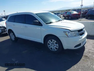 2014 Dodge Journey American Value z VIN 3C4PDCAB6ET217924, wystawiony jako IAAI lot #42345704 z przebiegiem 160 178 mil mil oraz . Historia ofert i sprzedaży dostępna na DreamBid. Obrazek 1.