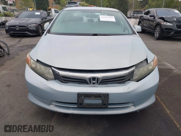 2012 Honda Civic LX with VIN 2HGFB2F58CH560126, listed as a IAAI auction lot 42097094 with 149,921 mi miles and . Bid and sale history available at DreamBid. Image 12.