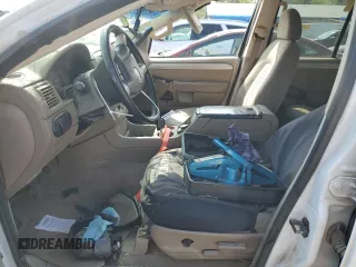 2002 Mercury Mountaineer z VIN 4M2ZU86E32ZJ27444, wystawiony jako Copart lot #75109744 z przebiegiem 194 298 mil mil oraz Szkody całkowita. Historia ofert i sprzedaży dostępna na DreamBid. Obrazek 7.