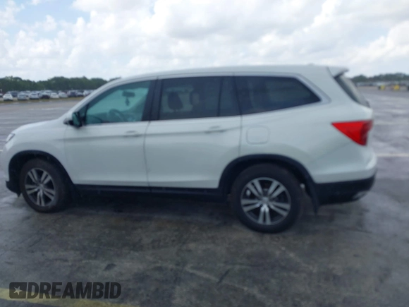 2016 Honda Pilot EX-L with VIN 5FNYF5H50GB043294, listed as a IAAI auction lot 41930654 with 92,728 mi miles and . Bid and sale history available at DreamBid. Image 14.