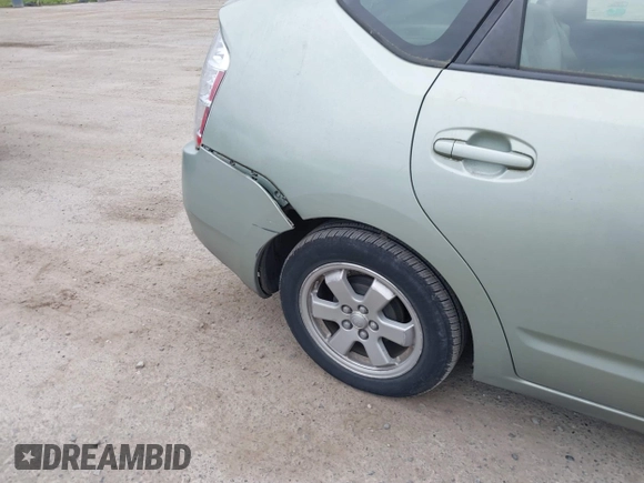 2007 Toyota Prius z VIN JTDKB20U673244214, wystawiony jako IAAI lot #42275166 z przebiegiem 190 480 mil mil oraz . Historia ofert i sprzedaży dostępna na DreamBid. Obrazek 14.