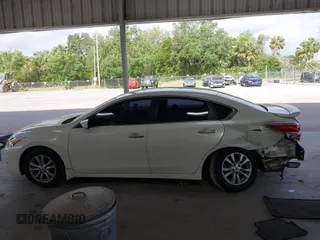 2014 Nissan Altima S with VIN 1N4AL3AP5EC136502, listed as a IAAI auction lot 42143885 with 116,923 mi miles and . Bid and sale history available at DreamBid. Image 14.