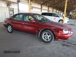 1999 Ford Taurus SE with VIN 1FAFP53S9XA297537, listed as a Copart auction lot 43862035 with 145,983 mi miles and Salvage title. Bid and sale history available at DreamBid. Image 4.