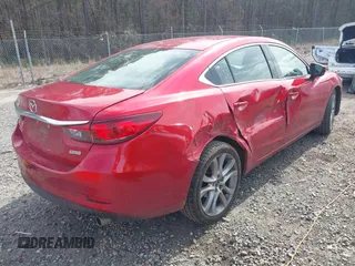 2017 Mazda Mazda6 Touring with VIN JM1GL1V56H1146909, listed as a IAAI auction lot 41709510 with 110,341 mi miles. Bid and sale history available at carsss.com. Image 4.