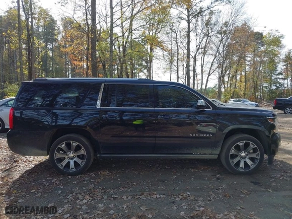 2015 Chevrolet Suburban LTZ with VIN 1GNSKKKC4FR304109, listed as a IAAI auction lot 40757721 with 192,652 mi miles. Bid and sale history available at carsss.com. Image 13.