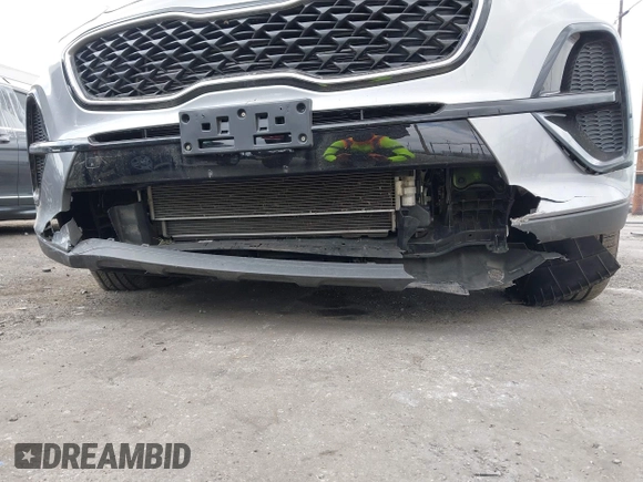 2020 Kia Sportage LX with VIN KNDPM3AC1L7761371, listed as a IAAI auction lot 42121834 with 38,411 mi miles and . Bid and sale history available at DreamBid. Image 6.