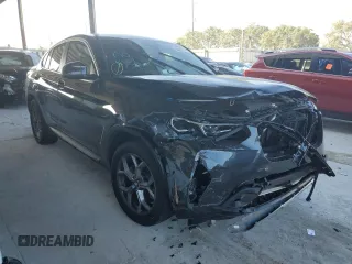 2022 BMW X4 xDrive30i z VIN 5UX33DT09N9L93053, wystawiony jako Copart lot #71710692 z przebiegiem Nie podano mil oraz . Historia ofert i sprzedaży dostępna na DreamBid. Obrazek 4.