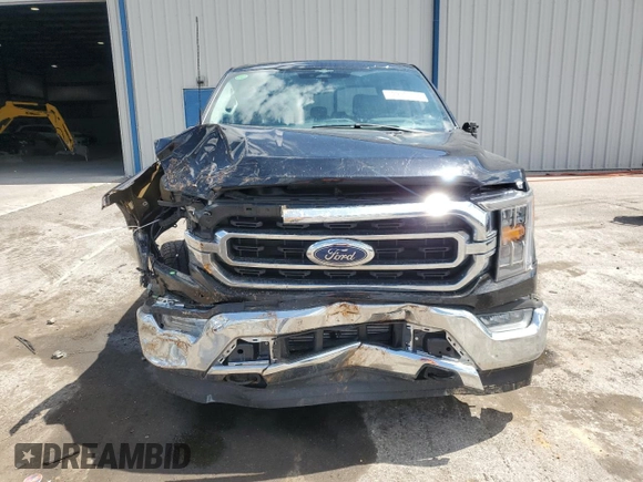 2023 Ford F-150 XL with VIN 1FTFW1E88PFC77984, listed as a Copart auction lot 62222845 with 36,957 mi miles and Salvage title. Bid and sale history available at DreamBid. Image 5.