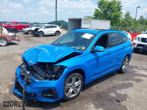 2021 BMW X1 xDrive28i with VIN WBXJG9C04M5T61811, listed as a IAAI auction lot 42509852 with 30,400 mi miles and . Bid and sale history available at DreamBid. Image 17.