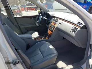 1999 Mercedes-Benz E-Class with VIN WDBJF82H4XX025925, listed as a IAAI auction lot 41839398 with 238,583 mi miles. Bid and sale history available at carsss.com. Image 5.