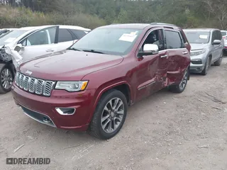 2017 Jeep Grand Cherokee Overland with VIN 1C4RJECG6HC719001, listed as a IAAI auction lot 41795517 with 103,076 mi miles. Bid and sale history available at carsss.com. Image 17.