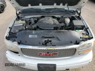 2005 GMC Sierra Denali z VIN 2GTEK63N551215749, wystawiony jako Copart lot #71357594 z przebiegiem 183 483 mil mil oraz Szkody całkowita. Historia ofert i sprzedaży dostępna na DreamBid. Obrazek 11.