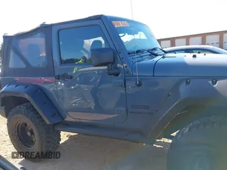 2015 Jeep Wrangler Sport with VIN 1C4AJWAG0FL591213, listed as a IAAI auction lot 41893306 with 107,807 mi miles and . Bid and sale history available at DreamBid. Image 13.