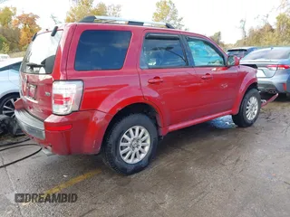 2010 Mercury Mariner Premier with VIN 4M2CN9HG5AKJ06111, listed as a IAAI auction lot 40740774 with 98,607 mi miles and . Bid and sale history available at DreamBid. Image 4.