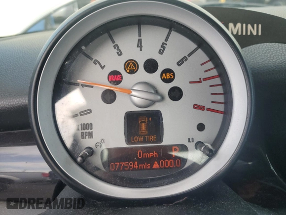 2010 MINI Hardtop S with VIN WMWMF7C59ATZ69213, listed as a Copart auction lot 54270705 with 77,594 mi miles and Salvage Title. Bid and sale history available at DreamBid. Image 9.