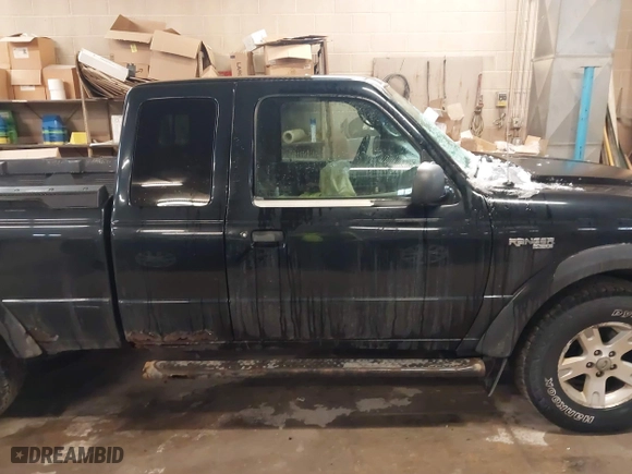 2003 Ford Ranger XL Fleet with VIN 1FTZR45EX3PA43491, listed as a IAAI auction lot 41492928 with 233,435 mi miles. Bid and sale history available at carsss.com. Image 13.