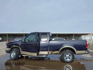 2000 Ford F-150 XL with VIN 1FTRX17L2YNB85627, listed as a IAAI auction lot 41377814 with 123,740 mi miles. Bid and sale history available at carsss.com. Image 15.