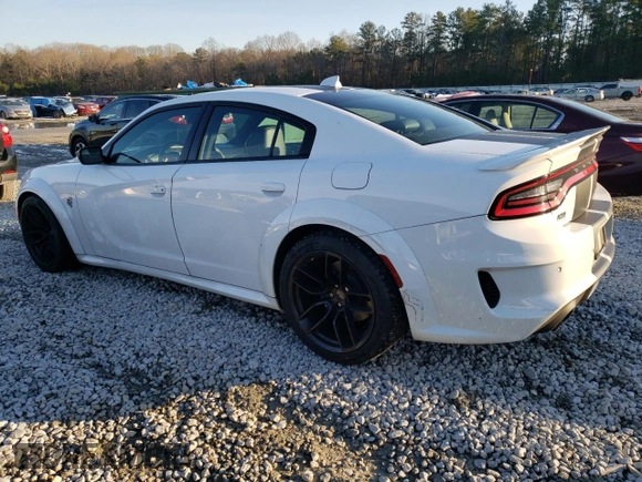 2023 Dodge Charger SRT Hellcat Redeye Widebody with VIN 2C3CDXL92PH630519, listed as a Copart auction lot 83360544 with 12,389 mi miles and Salvage Title. Bid and sale history available at DreamBid. Image 2.