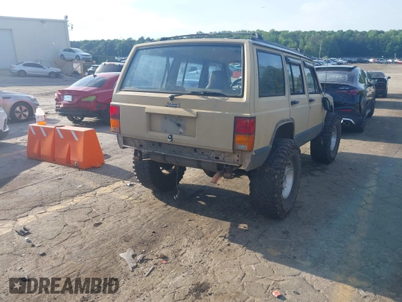 1995 Jeep Cherokee Sport with VIN 1J4FJ68S3SL555908, listed as a IAAI auction lot 42222016 with 283,444 mi miles and . Bid and sale history available at DreamBid. Image 4.