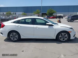 2016 Honda Civic Sedan LX with VIN 19XFC2F54GE215012, listed as a IAAI auction lot 42046334 with 146,348 mi miles. Bid and sale history available at carsss.com. Image 13.