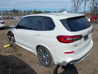 2020 BMW X5 M50i with VIN 5UXJU4C06LLE45651, listed as a IAAI auction lot 41618355 with 70,885 mi miles and . Bid and sale history available at DreamBid. Image 14.