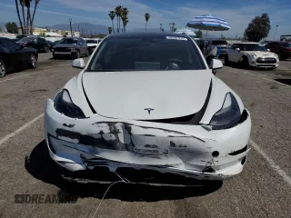 2023 Tesla Model 3 with VIN 5YJ3E1EA9PF401418, listed as a Copart auction lot 50597015 with 79,673 mi miles and Salvage Title. Bid and sale history available at DreamBid. Image 5.