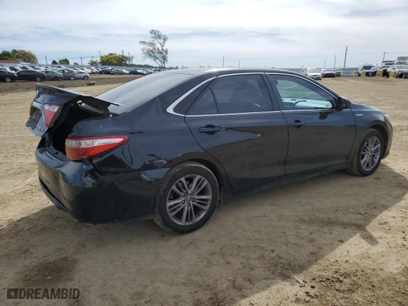 2015 Toyota Camry Hybrid LE with VIN 4T1BD1FK4FU157040, listed as a Copart auction lot 45740275 with 306,625 mi miles and Salvage Title. Bid and sale history available at carsss.com. Image 3.