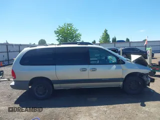 2000 Dodge Caravan SE with VIN 2B4GP44G4YR711580, listed as a IAAI auction lot 42367522 with 259,409 mi miles and . Bid and sale history available at DreamBid. Image 14.