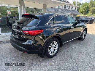 2014 Infiniti QX70 с VIN JN8CS1MW1EM411715, выставлен на аукционе Copart как лот 65465775 с пробегом 180 472 миль миль и Чистый • Clean title. История ставок и продаж доступна на DreamBid. Изображение 4.