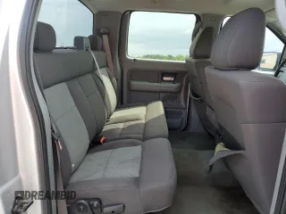 2005 Ford F-150 XLT with VIN 1FTRW12WX5FA79128, listed as a Copart auction lot 51963585 with 169,045 mi miles and Salvage Title. Bid and sale history available at carsss.com. Image 10.