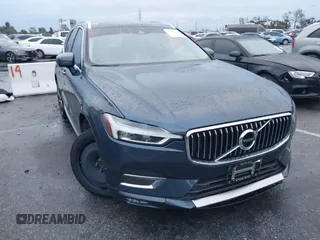 2019 Volvo XC60 Inscription z VIN LYV102RL3KB250397, wystawiony jako IAAI lot #41788380 z przebiegiem 58 391 mil mil oraz . Historia ofert i sprzedaży dostępna na DreamBid. Obrazek 1.