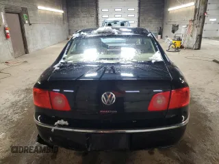 2005 Volkswagen Phaeton V8 z VIN WVWAF63D058000156, wystawiony jako Copart lot #83557884 z przebiegiem 173 284 mil mil oraz Szkody całkowita. Historia ofert i sprzedaży dostępna na DreamBid. Obrazek 6.