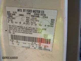2006 Ford Escape XLT with VIN 1FMCU03166KB47650, listed as a IAAI auction lot 41529751 with 153,962 mi miles. Bid and sale history available at carsss.com. Image 9.