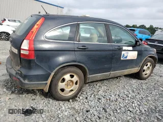 2009 Honda CR-V LX z VIN 5J6RE38309L015015, wystawiony jako Copart lot #56763035 z przebiegiem 211 946 mil mil oraz Szkoda całkowita • Salvage title. Historia ofert i sprzedaży dostępna na DreamBid. Obrazek 3.
